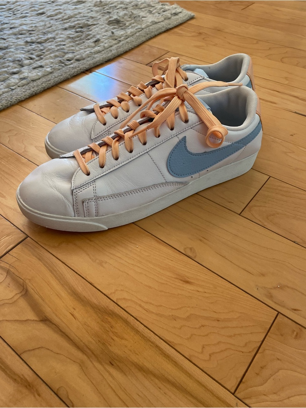 Nike Women’s Low-Top Leather Sneakers in White and Light Blue